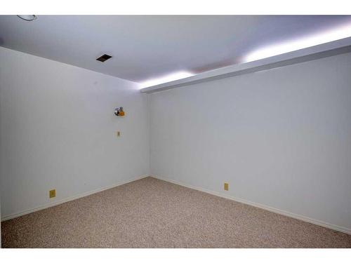 700 Woodpark Boulevard Sw, Calgary, AB - Indoor Photo Showing Other Room