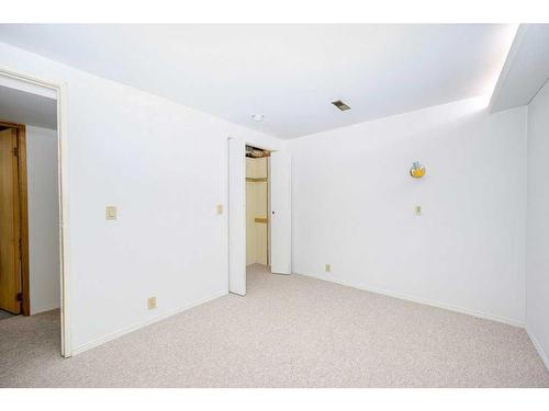 700 Woodpark Boulevard Sw, Calgary, AB - Indoor Photo Showing Other Room