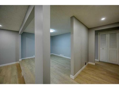 700 Woodpark Boulevard Sw, Calgary, AB - Indoor Photo Showing Other Room