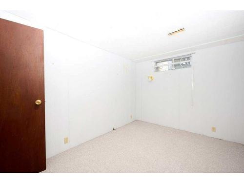 700 Woodpark Boulevard Sw, Calgary, AB - Indoor Photo Showing Other Room