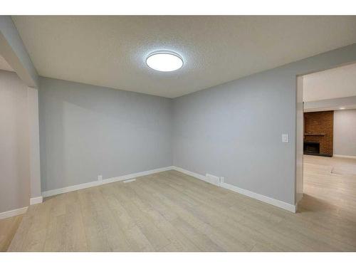 700 Woodpark Boulevard Sw, Calgary, AB - Indoor Photo Showing Other Room