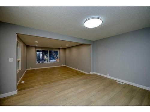 700 Woodpark Boulevard Sw, Calgary, AB - Indoor Photo Showing Other Room