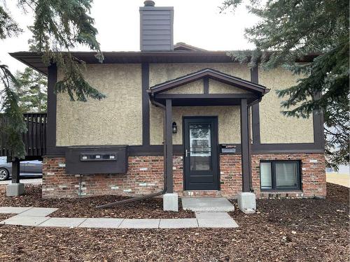 220 Storybook Terrace Nw, Calgary, AB - Outdoor With Facade