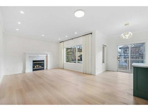 109 Mt. Douglas Green Se, Calgary, AB - Indoor Photo Showing Living Room With Fireplace