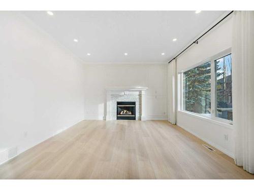 109 Mt. Douglas Green Se, Calgary, AB - Indoor Photo Showing Living Room With Fireplace