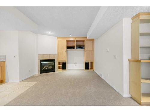 109 Mt. Douglas Green Se, Calgary, AB - Indoor With Fireplace