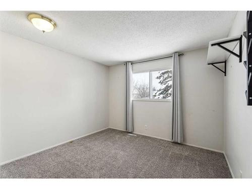 115 Pineson Place Ne, Calgary, AB - Indoor Photo Showing Other Room