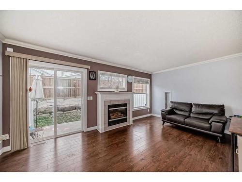 123 Country Hills Villas Nw, Calgary, AB - Indoor Photo Showing Living Room With Fireplace