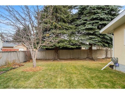 7443 Huntertown Crescent Nw, Calgary, AB - Outdoor With Backyard