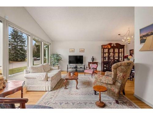 7443 Huntertown Crescent Nw, Calgary, AB - Indoor Photo Showing Living Room