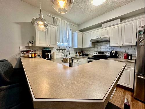 118-126 14 Avenue Sw, Calgary, AB - Indoor Photo Showing Kitchen With Stainless Steel Kitchen