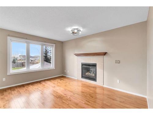 160 Aspen Mews, Strathmore, AB - Indoor Photo Showing Living Room With Fireplace