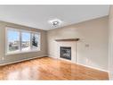 160 Aspen Mews, Strathmore, AB  - Indoor Photo Showing Living Room With Fireplace 