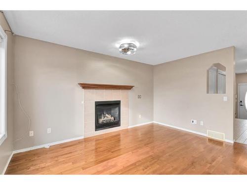 160 Aspen Mews, Strathmore, AB - Indoor With Fireplace