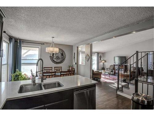 56 Strathclair Place Sw, Calgary, AB - Indoor Photo Showing Kitchen With Double Sink