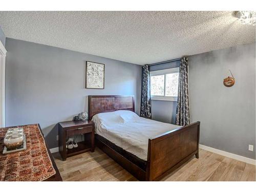 56 Strathclair Place Sw, Calgary, AB - Indoor Photo Showing Bedroom