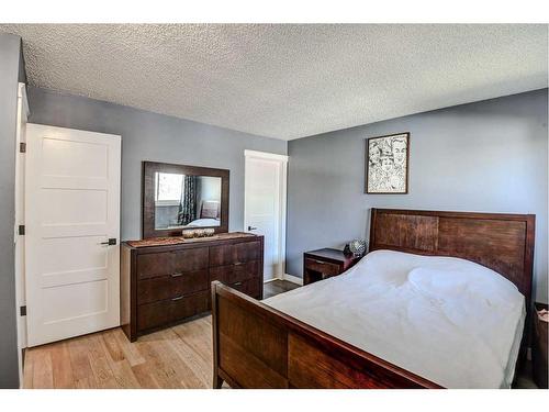 56 Strathclair Place Sw, Calgary, AB - Indoor Photo Showing Bedroom