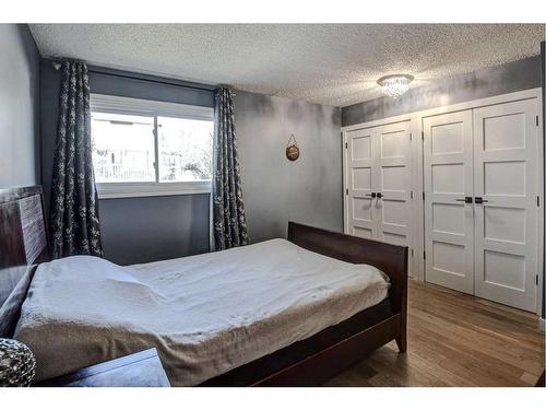 56 Strathclair Place Sw, Calgary, AB - Indoor Photo Showing Bedroom