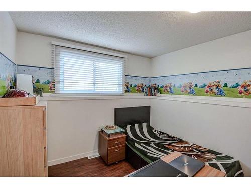 56 Strathclair Place Sw, Calgary, AB - Indoor Photo Showing Bedroom