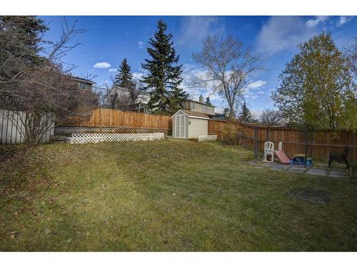 56 Strathclair Place Sw, Calgary, AB - Outdoor With Backyard