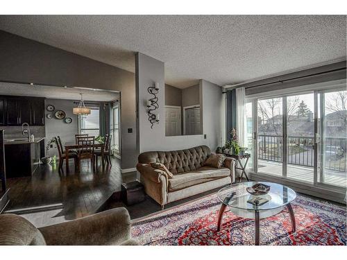 56 Strathclair Place Sw, Calgary, AB - Indoor Photo Showing Living Room