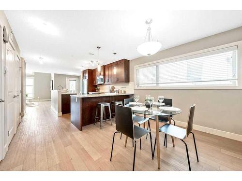 212-1905 27 Avenue Sw, Calgary, AB - Indoor Photo Showing Dining Room