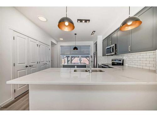 370 Masters Road Se, Calgary, AB - Indoor Photo Showing Kitchen With Double Sink With Upgraded Kitchen