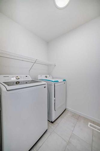 370 Masters Road Se, Calgary, AB - Indoor Photo Showing Laundry Room