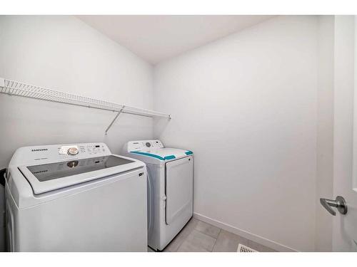 370 Masters Road Se, Calgary, AB - Indoor Photo Showing Laundry Room