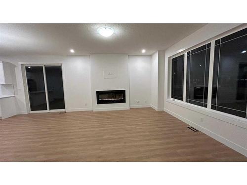 20 Cityline Mount Ne, Calgary, AB - Indoor Photo Showing Living Room With Fireplace