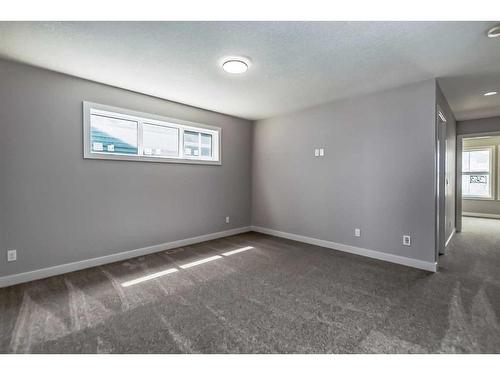 148 Sundown Crescent, Cochrane, AB - Indoor Photo Showing Other Room