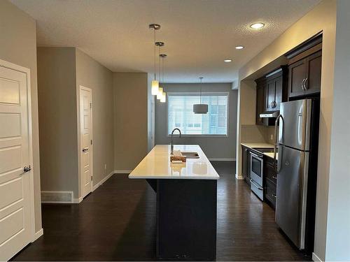 106 Panatella Walk Nw, Calgary, AB - Indoor Photo Showing Kitchen With Stainless Steel Kitchen