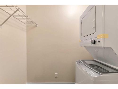 1301-1317 27 Street Se, Calgary, AB - Indoor Photo Showing Laundry Room