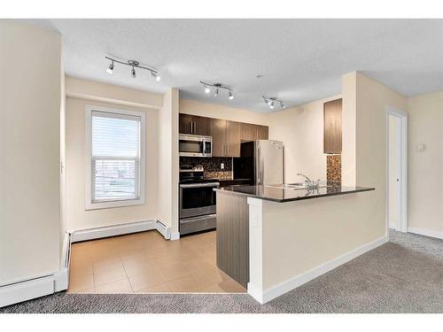 1301-1317 27 Street Se, Calgary, AB - Indoor Photo Showing Kitchen