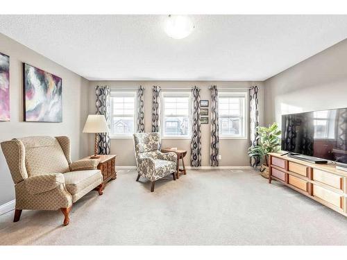 24 Thoroughbred Boulevard, Cochrane, AB - Indoor Photo Showing Living Room