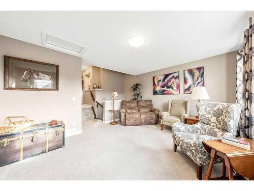 24 Thoroughbred Boulevard, Cochrane, AB - Indoor Photo Showing Living Room