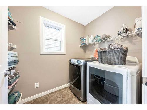 24 Thoroughbred Boulevard, Cochrane, AB - Indoor Photo Showing Laundry Room