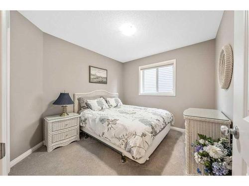 24 Thoroughbred Boulevard, Cochrane, AB - Indoor Photo Showing Bedroom