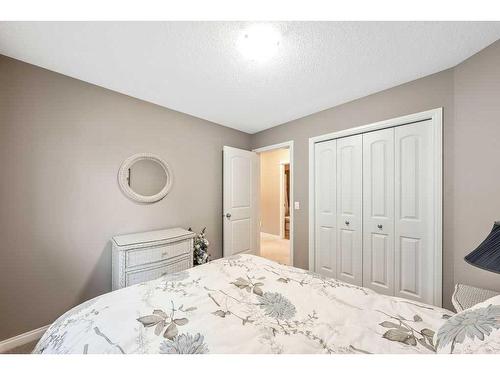 24 Thoroughbred Boulevard, Cochrane, AB - Indoor Photo Showing Bedroom