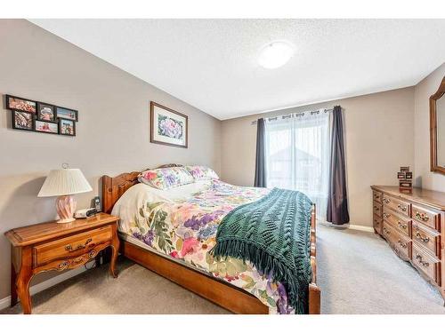 24 Thoroughbred Boulevard, Cochrane, AB - Indoor Photo Showing Bedroom