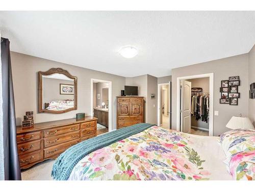 24 Thoroughbred Boulevard, Cochrane, AB - Indoor Photo Showing Bedroom