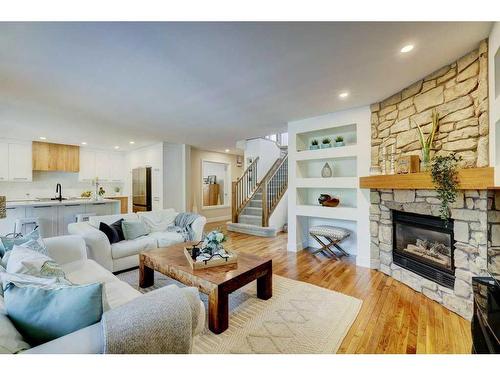 40 Gleneagles View, Cochrane, AB - Indoor Photo Showing Living Room With Fireplace