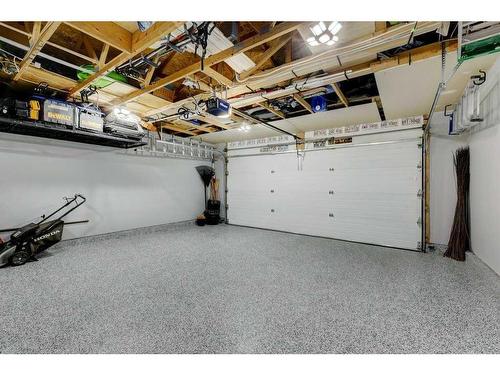 40 Gleneagles View, Cochrane, AB - Indoor Photo Showing Garage