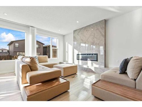 29 Rowley Terrace Nw, Calgary, AB - Indoor Photo Showing Living Room With Fireplace