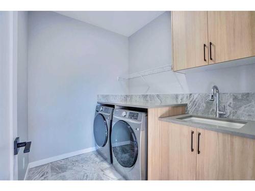 534 Lucas Nw, Calgary, AB - Indoor Photo Showing Laundry Room