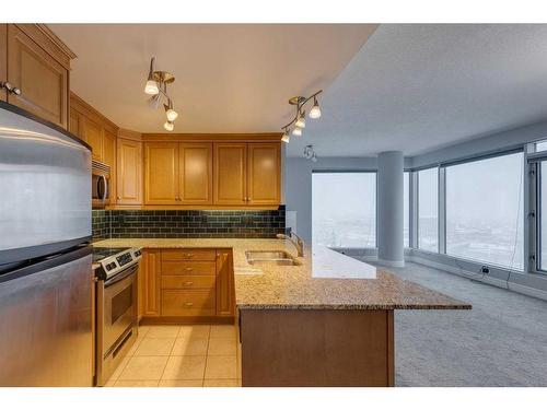 1403-910 5 Avenue Sw, Calgary, AB - Indoor Photo Showing Kitchen With Double Sink