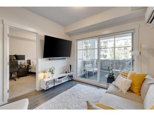 8103-151 Legacy Main Street Se, Calgary, AB - Indoor Photo Showing Living Room