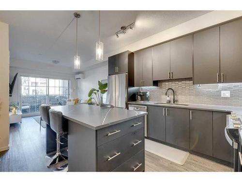 8103-151 Legacy Main Street Se, Calgary, AB - Indoor Photo Showing Kitchen With Upgraded Kitchen