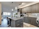 8103-151 Legacy Main Street Se, Calgary, AB  - Indoor Photo Showing Kitchen With Upgraded Kitchen 