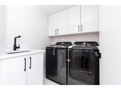 10616 Mapleglen Crescent Se, Calgary, AB - Indoor Photo Showing Laundry Room